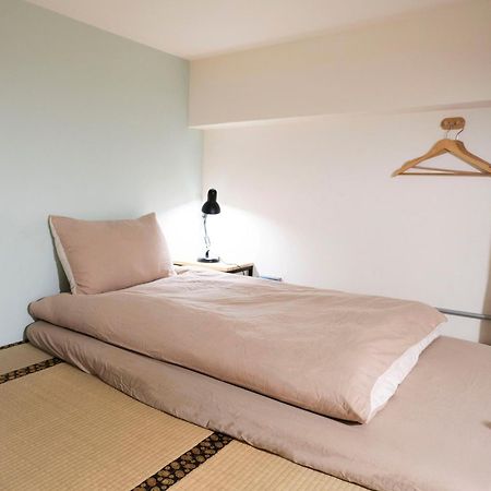 Lento Hostel Тайнан Стая снимка